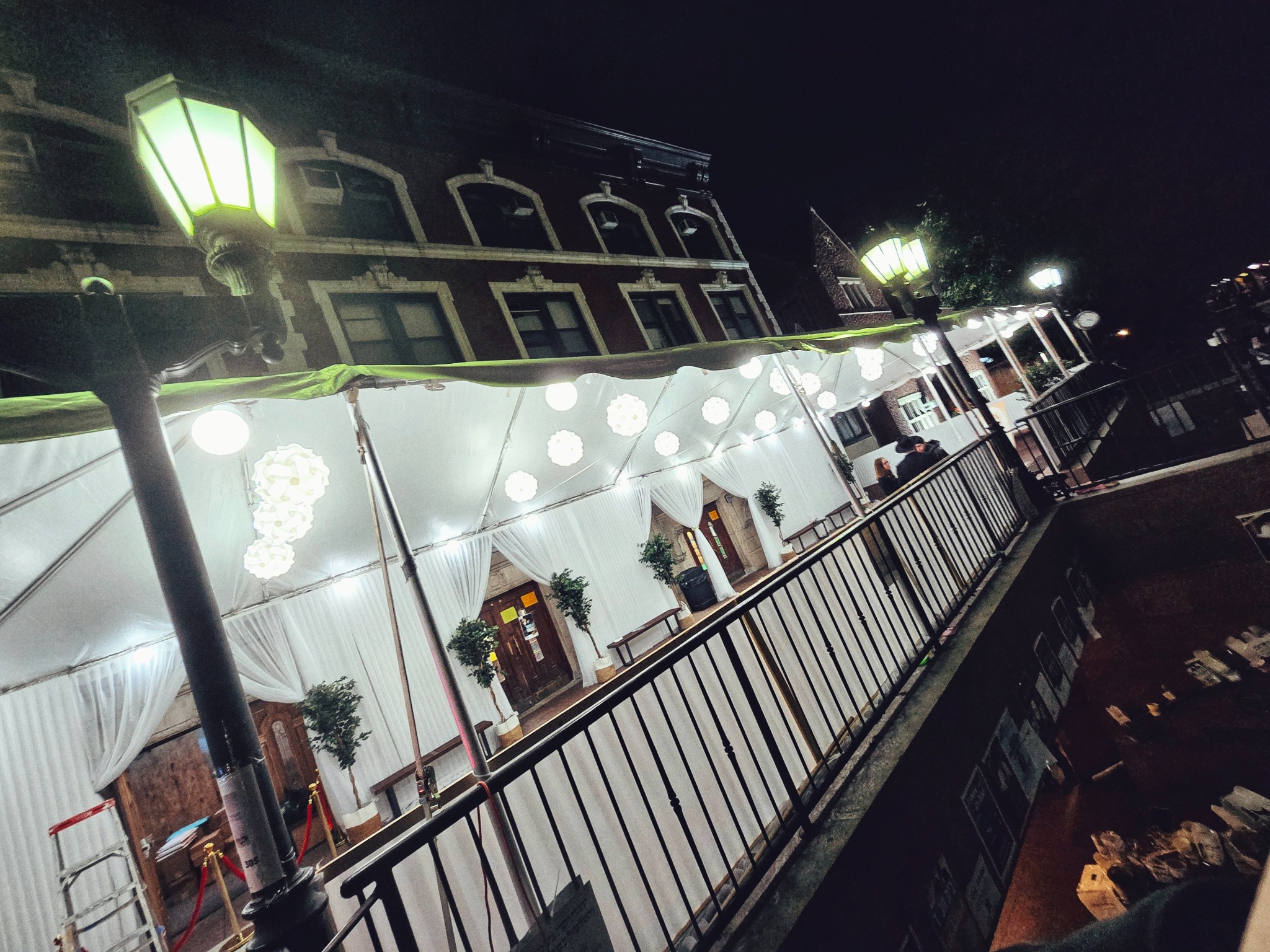 Women’s Pavilion exterior along the plaza at night